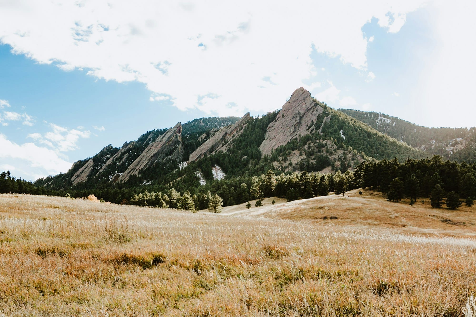 The Flatirons rising above the grasslands west of Boulder, Colorado