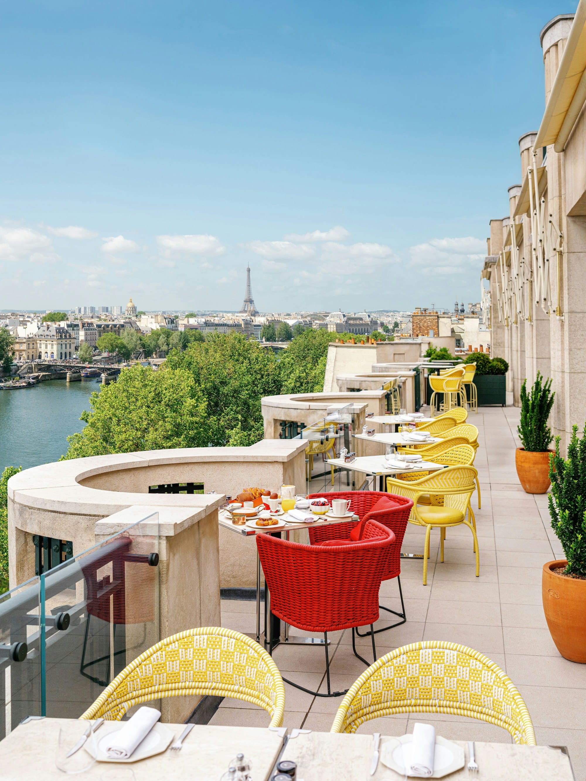 The Le Tout-Paris terrace over the Seine with the Eiffel Tower beyond