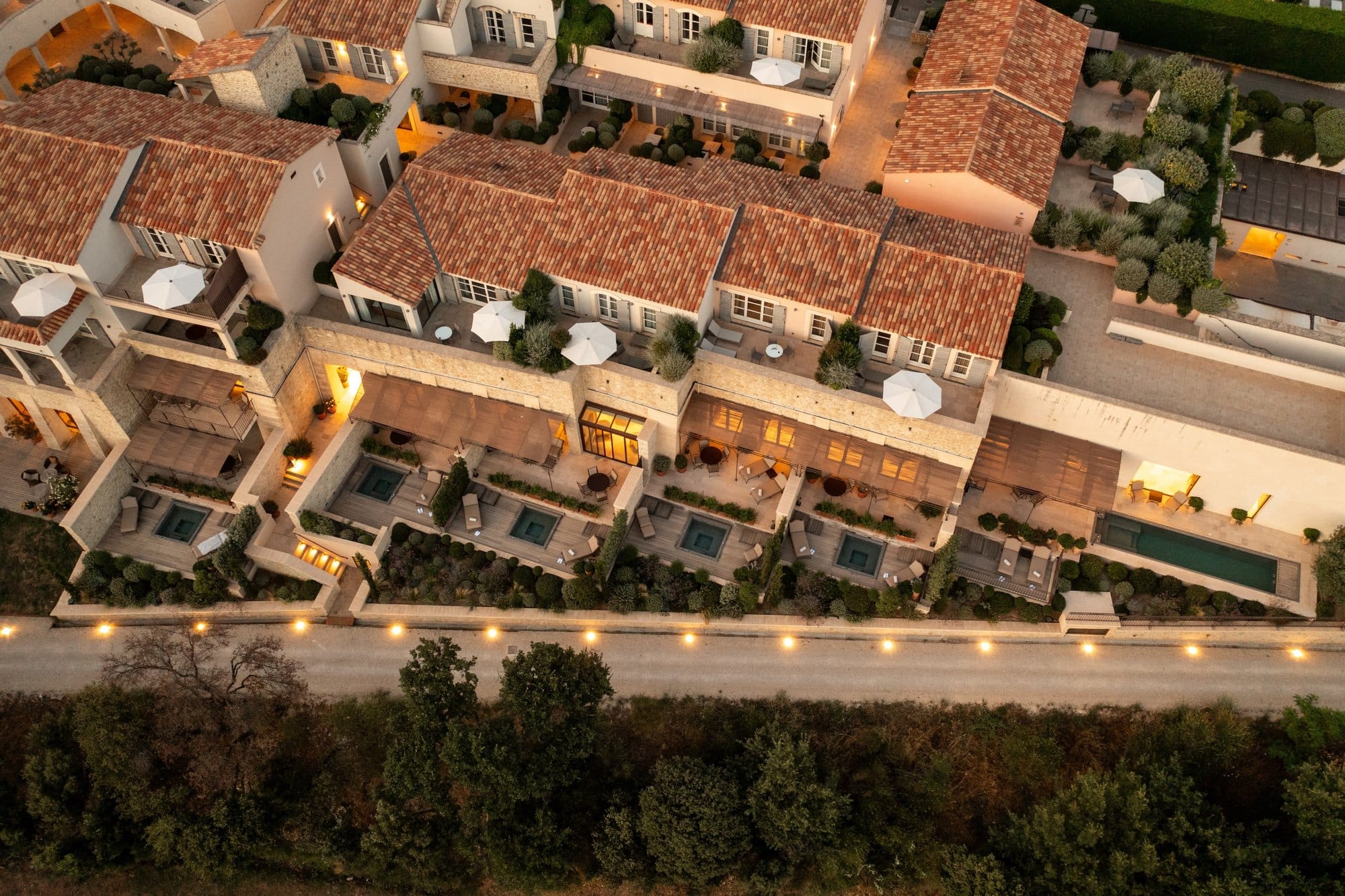 Aerial view of the stone hamlet of Coquillade Provence with its terraces and roofs