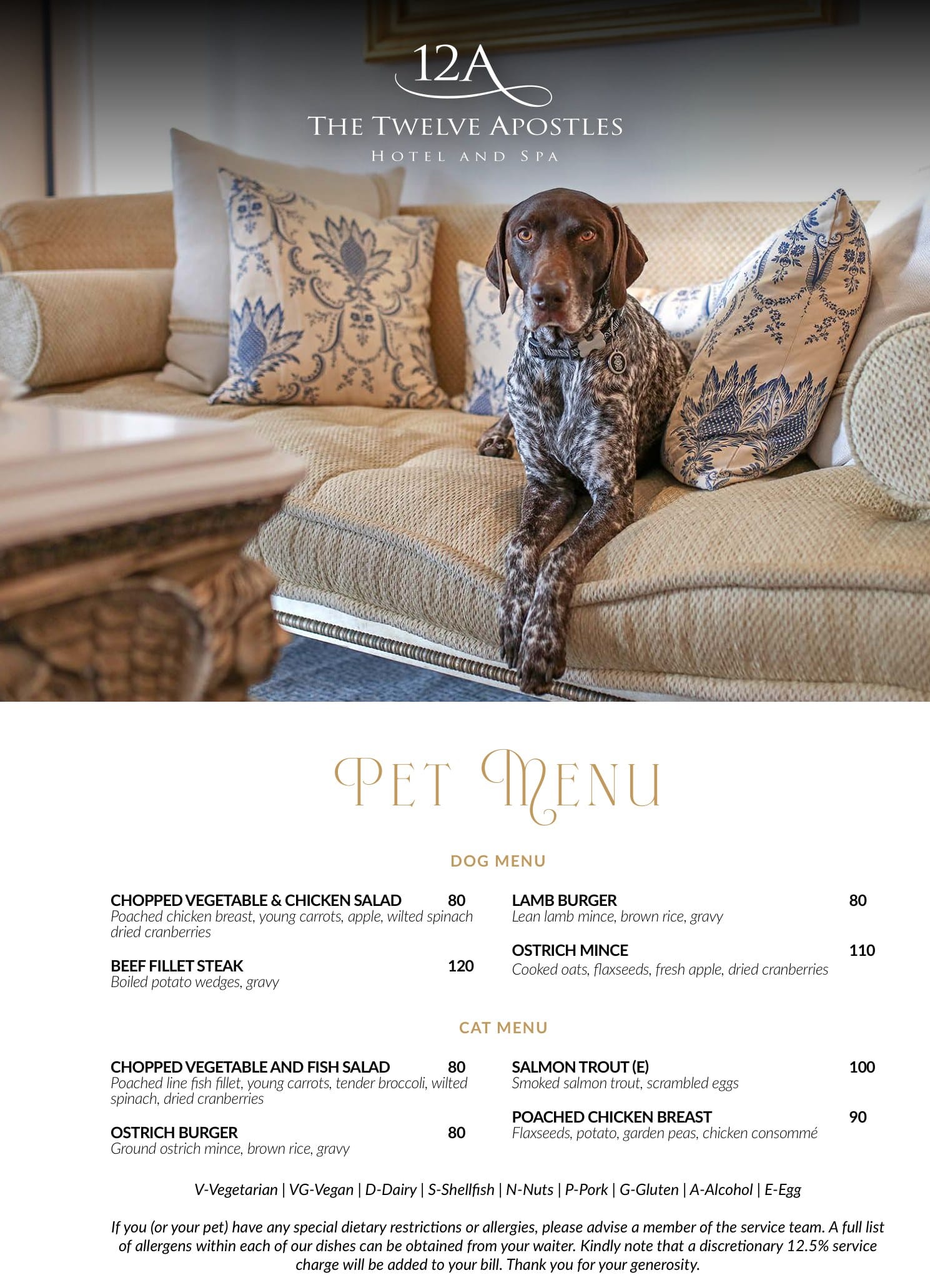 The Twelve Apostles pet menu, a German shorthaired pointer sitting on a sofa above the dog and cat menus