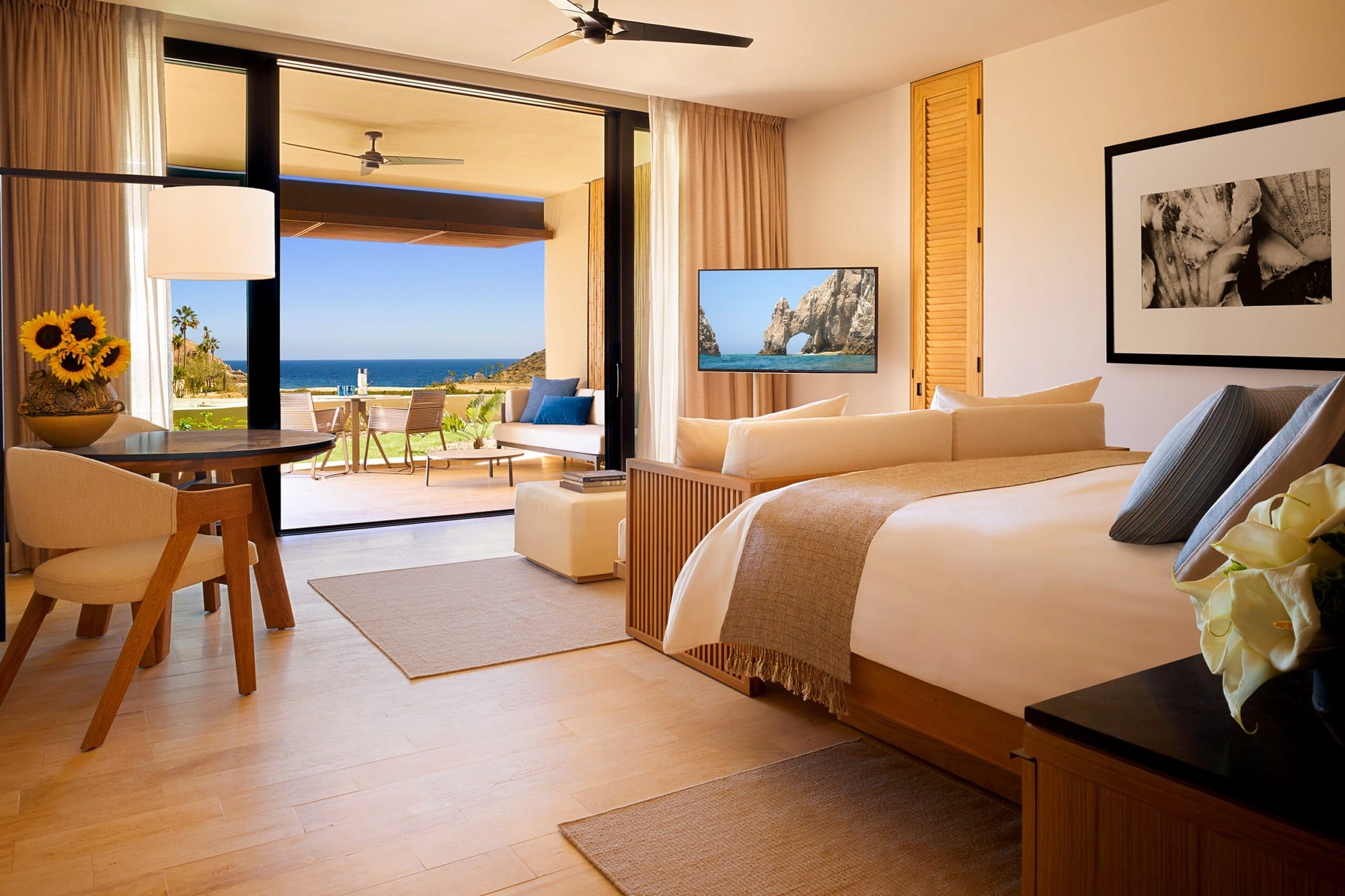 An ocean view guestroom at Montage Los Cabos opening onto a terrace