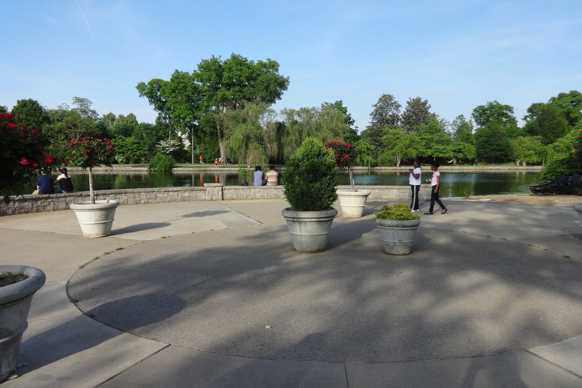 Lake Watauga in Centennial Park, Nashville, with willows and lawns beyond a paved terrace