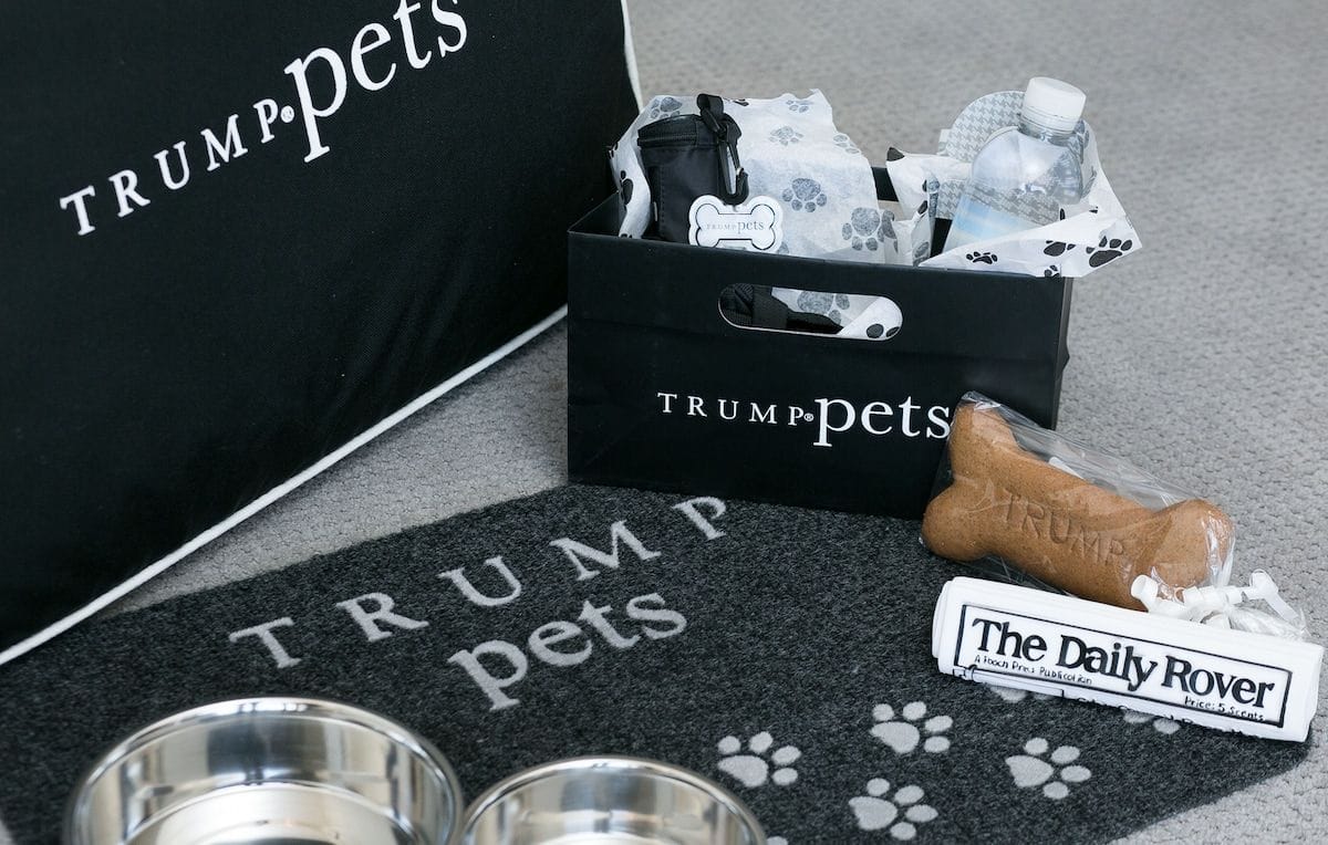 The Trump Pets welcome kit with bowls, mat, treats and a toy newspaper