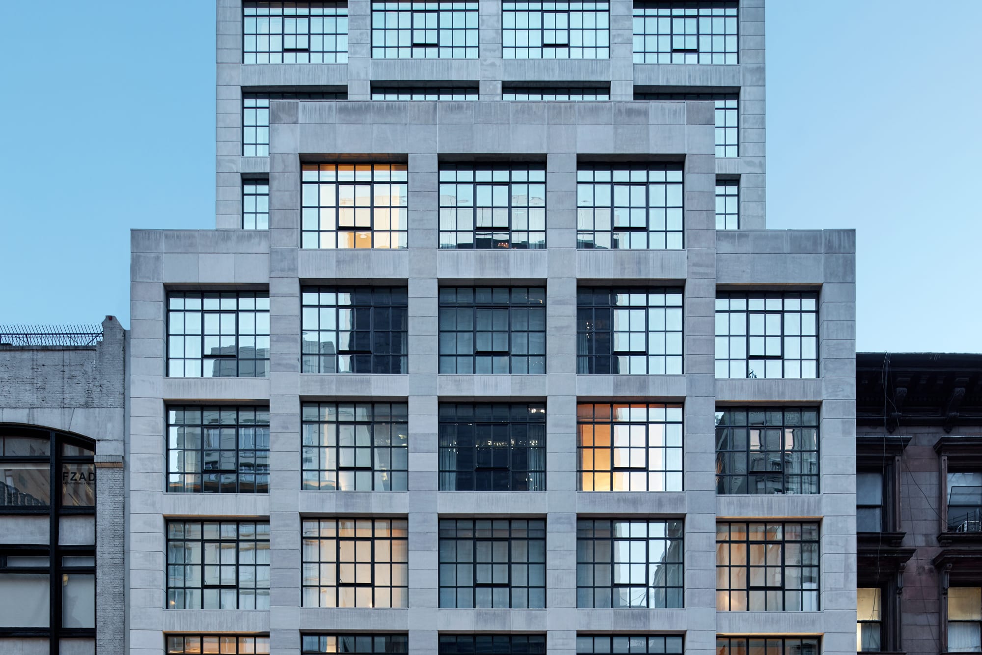 The stone and steel window facade of The Whitby Hotel on West 56th Street
