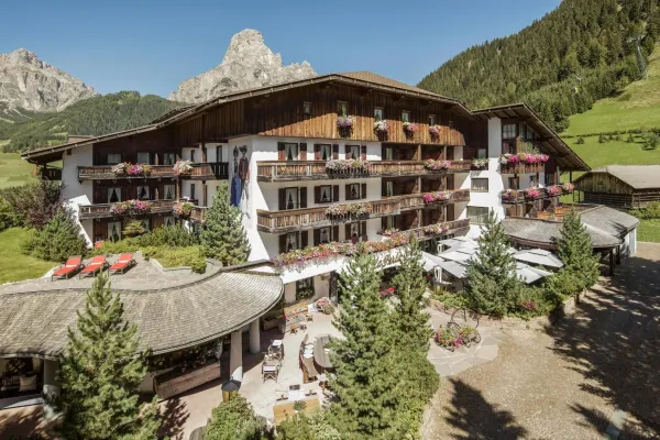 Hotel La Perla in Corvara, with the Dolomites behind